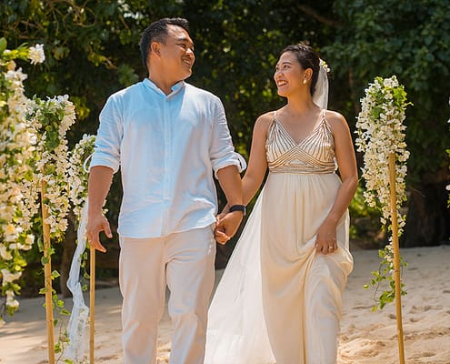 Filipino couple walk down the aisle Filipino couple walk down the aisle